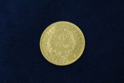 null 
Pièce en or de 40 francs Napoléon tête laurée, Empire Français. (1812 A)

TTB...