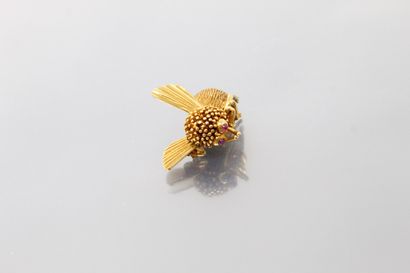 null 18K (750) yellow gold bumblebee brooch with cabochon rubies in the eyes.

Circa...