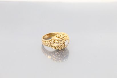 null 
“Dome” ring in molded 18K (750) yellow gold alternating smooth parts and patterns...