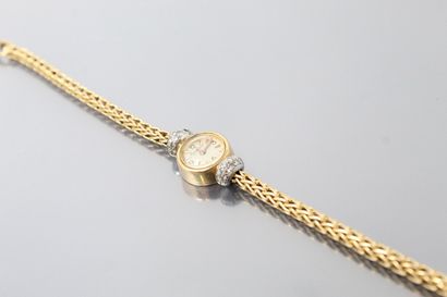 null JAEGER LECOULTRE

Montre bracelet de dame en or jaune 18K (750) et platine,...