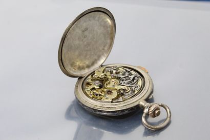 null ANONYMOUS

Early 20th century

Silver watch with chronograph and quarter repeater....