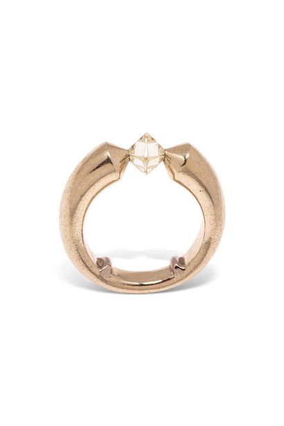 null 18K (750) yellow gold ring set with a rough octahedral diamond.

Partial master...