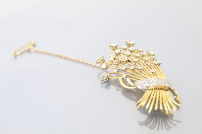 null 18K (750) yellow gold and platinum "sheaf" brooch set with brilliant-cut, half-cut,...