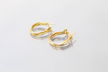 null CARTIER

Pair of 18K (750) yellow, pink and white gold hoop earrings.

Signed...