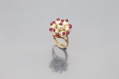 null 
Indian-inspired 18K (750) yellow gold "flower" ring set with seven white cultured...
