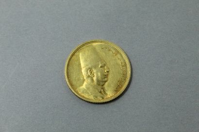 null Gold coin of 100 Piastres Fouad I of Egypt.

Weight : 8.49 g.
