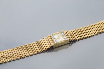 null ARIEL 

Montre bracelet de dame, boîtier rectangulaire en or jaune et gris 18K...