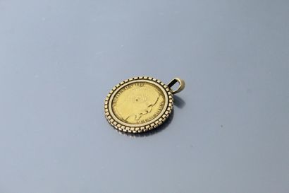 null Pièce en or de 20 francs Napoléon III tête nue (1855 A) 

Montée en pendentif...