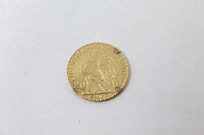 Pièce en or de 20 francs Coq 1907.

Poids...