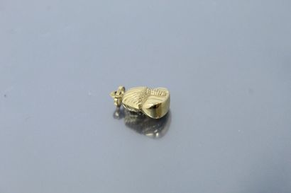 null Pendentif en or jaune 18k (750), figurant Pharaon.

Poids : 0.90 g.