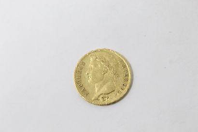 Pièce en or Napoléon Ier tête laurée 1810...