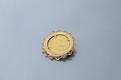 null Pièce en or de 20 francs Napoléon III tête nue (1858 A). 

Montée en broche...