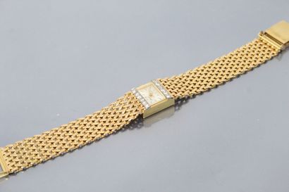 null ARIEL 

Montre bracelet de dame, boîtier rectangulaire en or jaune et gris 18K...