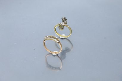 Two 18k (750) yellow gold ring settings.

Weight...