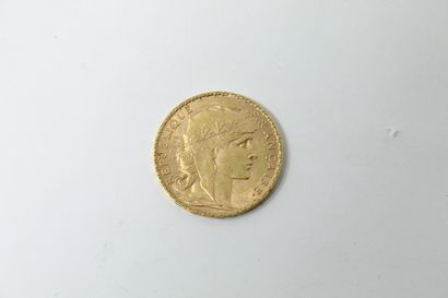 Pièce en or de 20 francs Coq 1904.

TTB à...