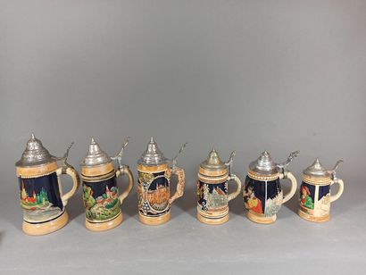 null Set of 6 mugs of various sizes in enamelled stoneware with relief decoration...