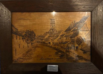 null Two pyrogravures representing village views, signed and annotated "MASEVAUX".

H.:...