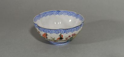 null CHINA, 20th century

Small poly-lobed porcelain cup with polychrome enamelled...