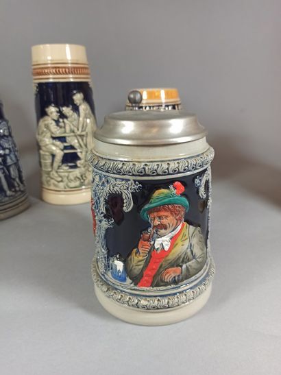 null German work.

Set of 6 enamelled stoneware beer mugs with relief decoration...