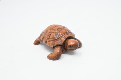 null JAPAN - 20th century

Two wooden netsuke representing two turtles, on one of...