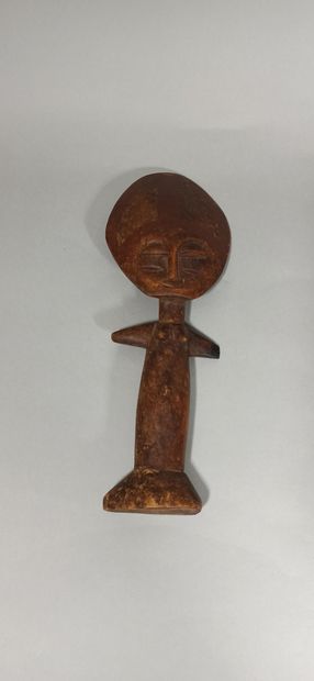 null Wooden statuette with arms spread out, 

h.:31 cm