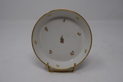 null SEVRES 

White porcelain cup with decoration all face of gilded flowers, the...