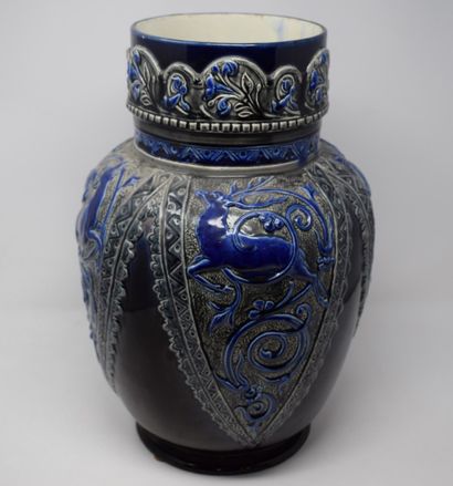 null CHOISY LE ROI

Blue earthenware vase with animals in relief

H.: 41 cm - Neck:...