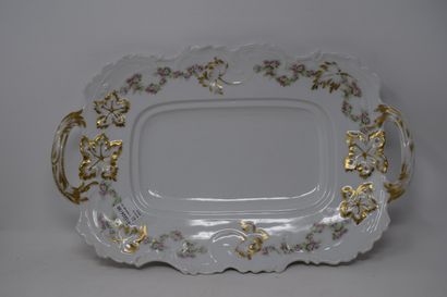 null Porcelain asparagus dish decorated with garlands of roses and golden foliage....