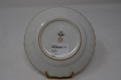 null SEVRES 

Small plate or saucer in white porcelain, the wing gadrooned with the...