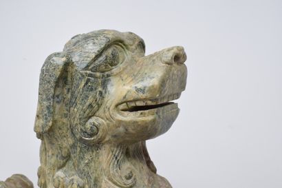 null CHINA - 20th century.

Green hard stone Dog of Fô. 

H. 40 cm