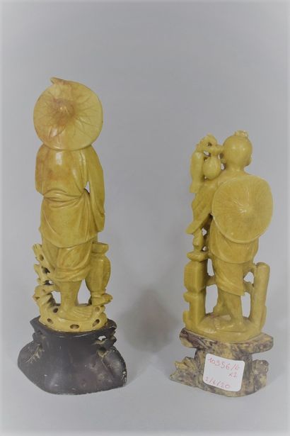 null CHINA - About 1900

Two carved soapstone statuettes of fishermen,

H. 24,2 ;...