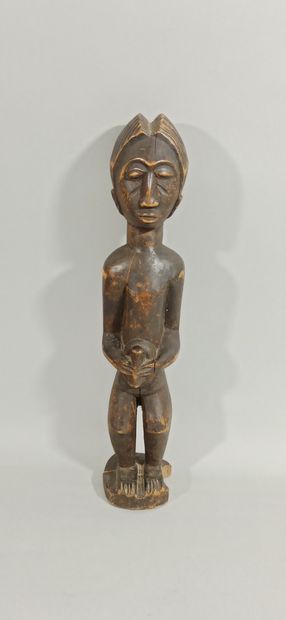 null Baule statuette, Ivory Coast.

Height: 44.5 cm