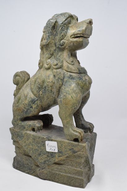 null CHINA - 20th century.

Green hard stone Dog of Fô. 

H. 40 cm