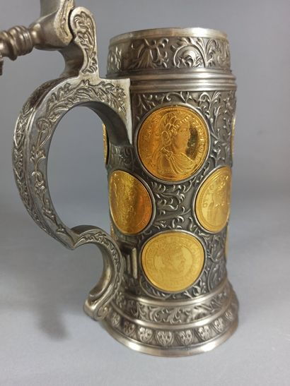 null German work,

Commemorative pewter mug richly decorated with medals enhanced...