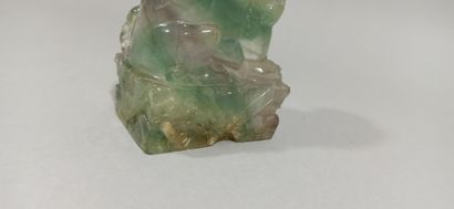 null CHINA - 20th century

Fluorite group, seated chimera, paw on the power ball....