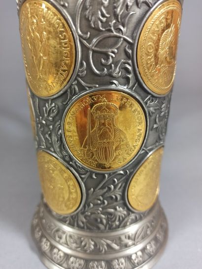 null German work,

Commemorative pewter mug richly decorated with medals enhanced...