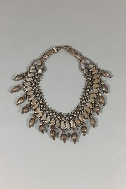 null Set of three silver headdresses, two of which are embellished with chased and...