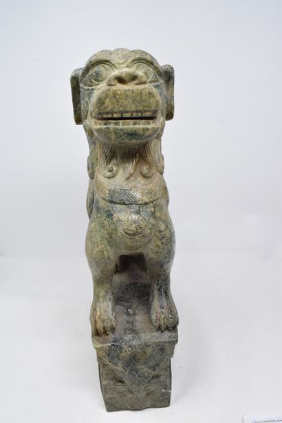null CHINA - 20th century.

Green hard stone Dog of Fô. 

H. 40 cm