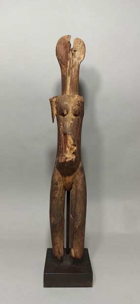 null Female statue in carved wood representing a standing figure. 

Face very damaged

Height:...