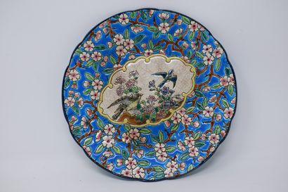 null 
LONGWY





Three earthenware plates in cloisonné enamels, with floral decoration...