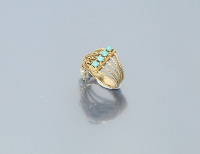 null 18k (750) yellow gold ring with 5 twisted rings set with turquoise and 3 small...