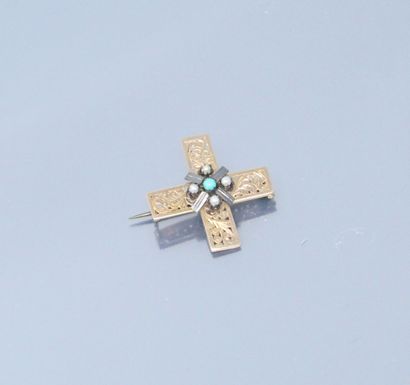 null Cross-shaped pin in 18k (750) yellow gold set with four baroque pearls and a...
