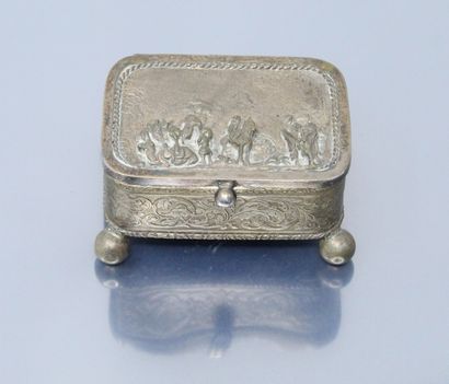 null Small metal jewellery box resting on four ball feet, the lid with a round humpback...