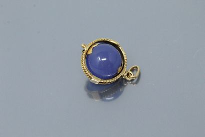 null Pendant in 18k (750) yellow gold with a blue glass ball in its center.

Gross...