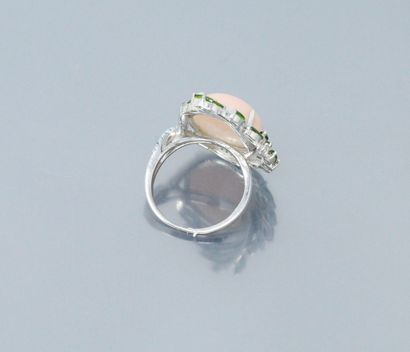 null Silver ring set with a cabochon of pink stone, chrome diopside and round turquoise....