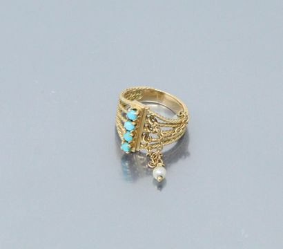 null 18k (750) yellow gold ring with 5 twisted rings set with turquoise and 3 small...