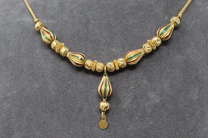null 18K (750) yellow gold necklace with alternating faceted and pear-shaped elements...