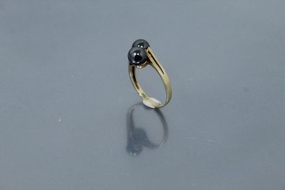 null 18k (750) yellow gold ring set with hematite pearls. 

Finger size : 55 - Gross...
