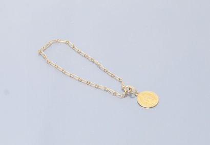null 9k (375) yellow gold bracelet with horse chain and a 18k (750) yellow gold medal....