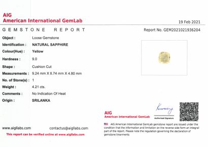 null Cushion yellow sapphire on paper. 

Accompanied by an AIG certificate indicating...